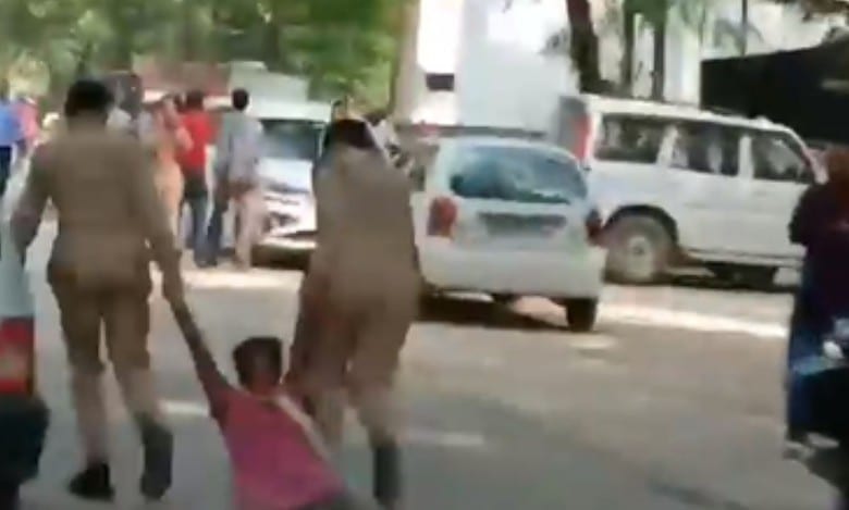 Probe ordered after woman 'dragged on road by UP cops'