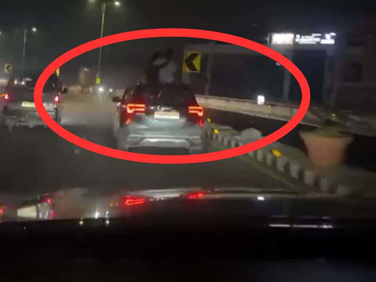 couple kissing on car in Hyderabad