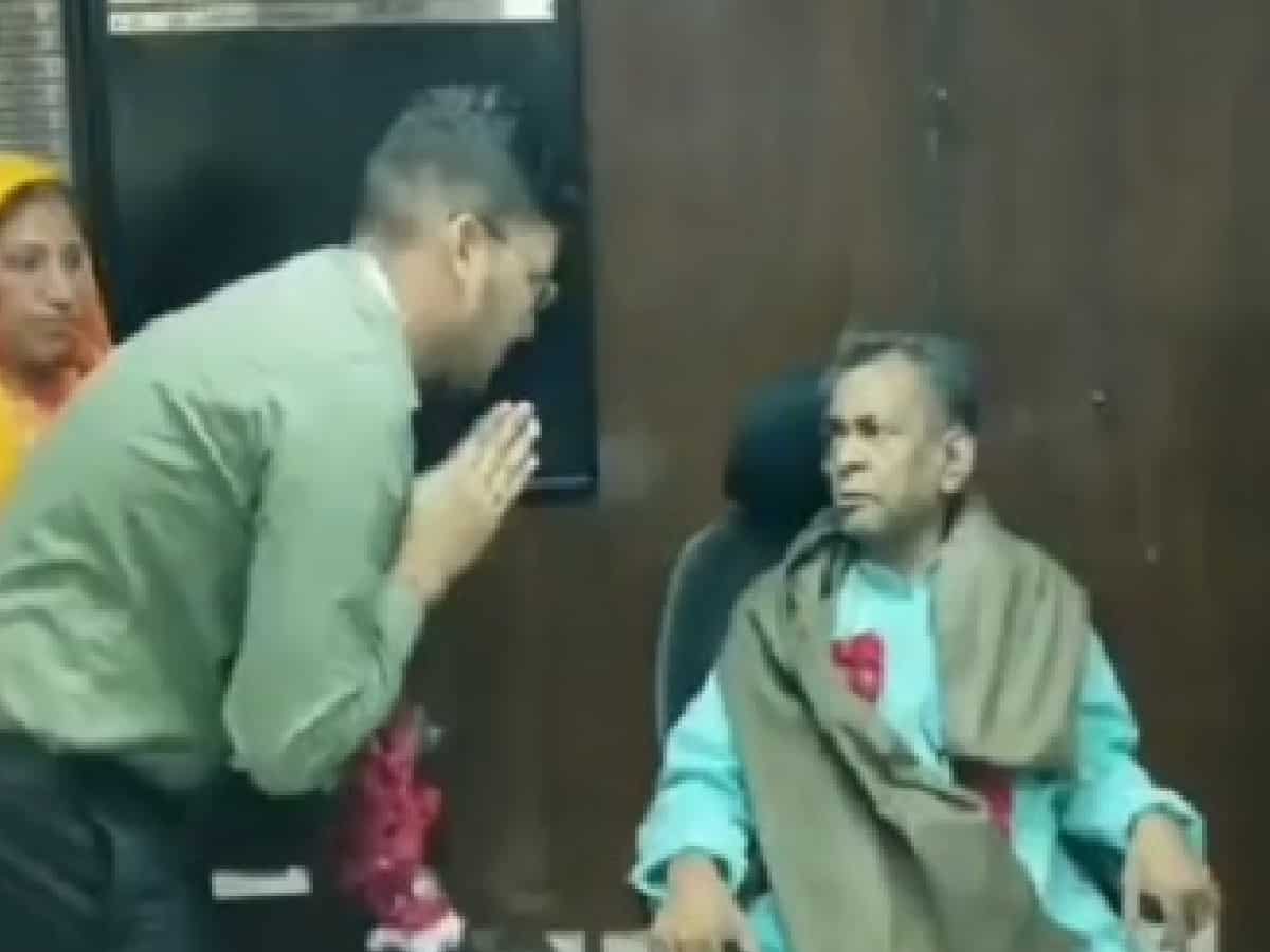 Video showing IAS officer offering shawl, his chair to priest goes viral