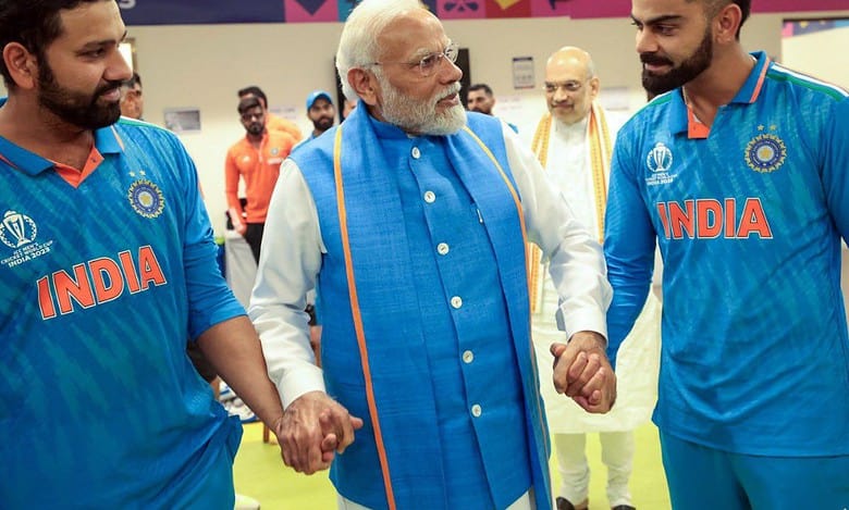 Ahmedabad, Nov 20 (ANI): Prime Minister Narendra Modi consoles cricketers Rohit Sharma and Virat Kohli as the PM meets the players of Team India in their dressing room to raise their spirits after India's loss to Australia by 6 wickets in the ICC Men's Cricket World Cup 2023 final match at Narendra Modi Stadium in Ahmedabad recently. Australia win their sixth ICC ODI World Cup title. Union Home Minister Amit Shah also seen. (ANI Photo)