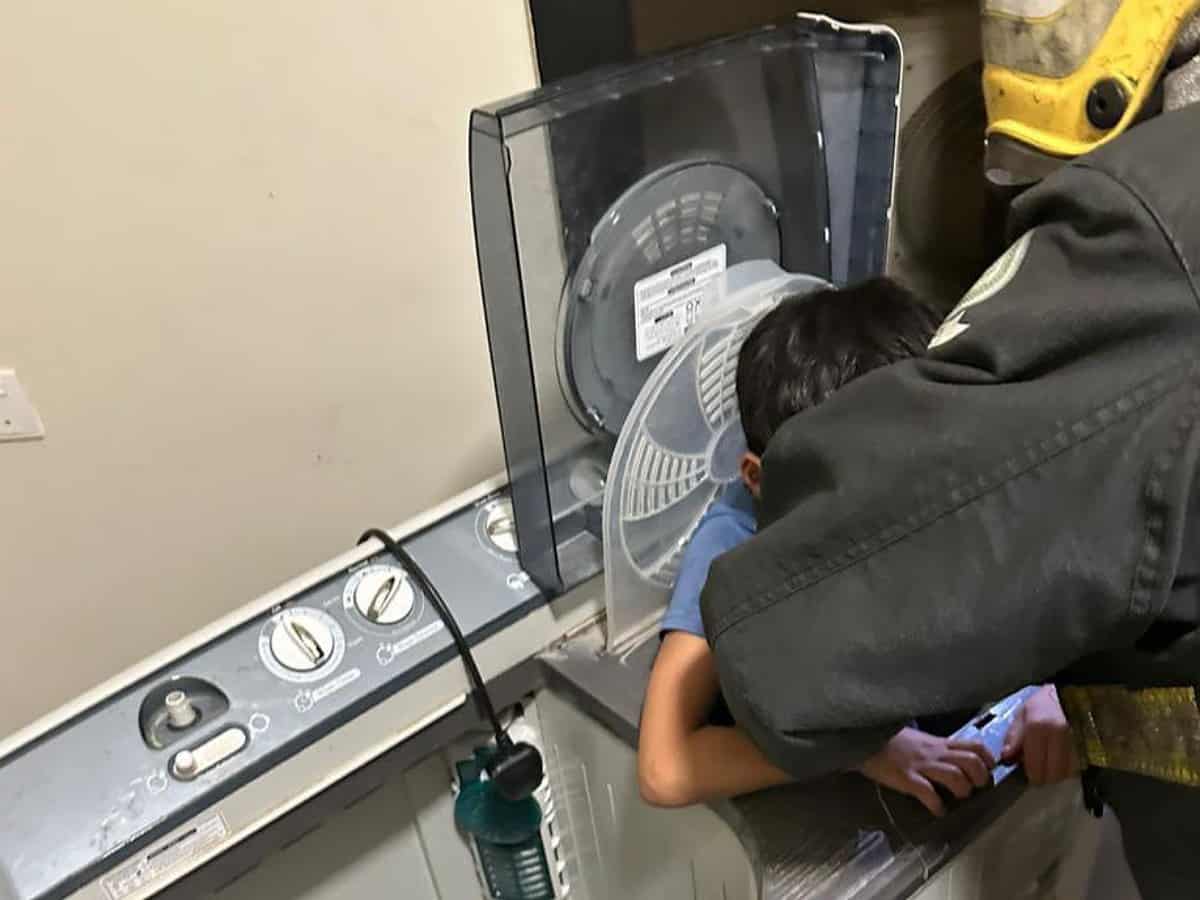 Saudi: Boy rescued from washing machine after getting stuck