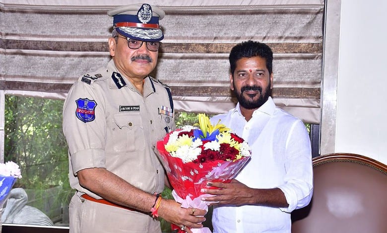 Telangana DGP Anjani Kumar meets Revanth Reddy along with Mahesh Bhagwat