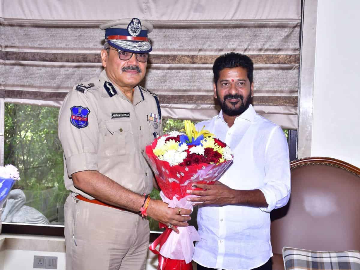 Telangana DGP Anjani Kumar meets Revanth Reddy along with Mahesh Bhagwat