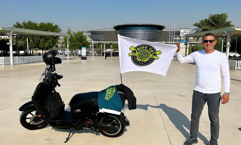 World record holder rides electric motorcycle from Egypt to Dubai for COP28