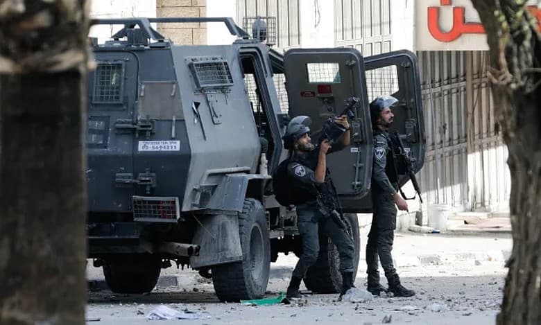 Israel's defence minister says troops to remain in some West Bank refugee camps for 'coming year'