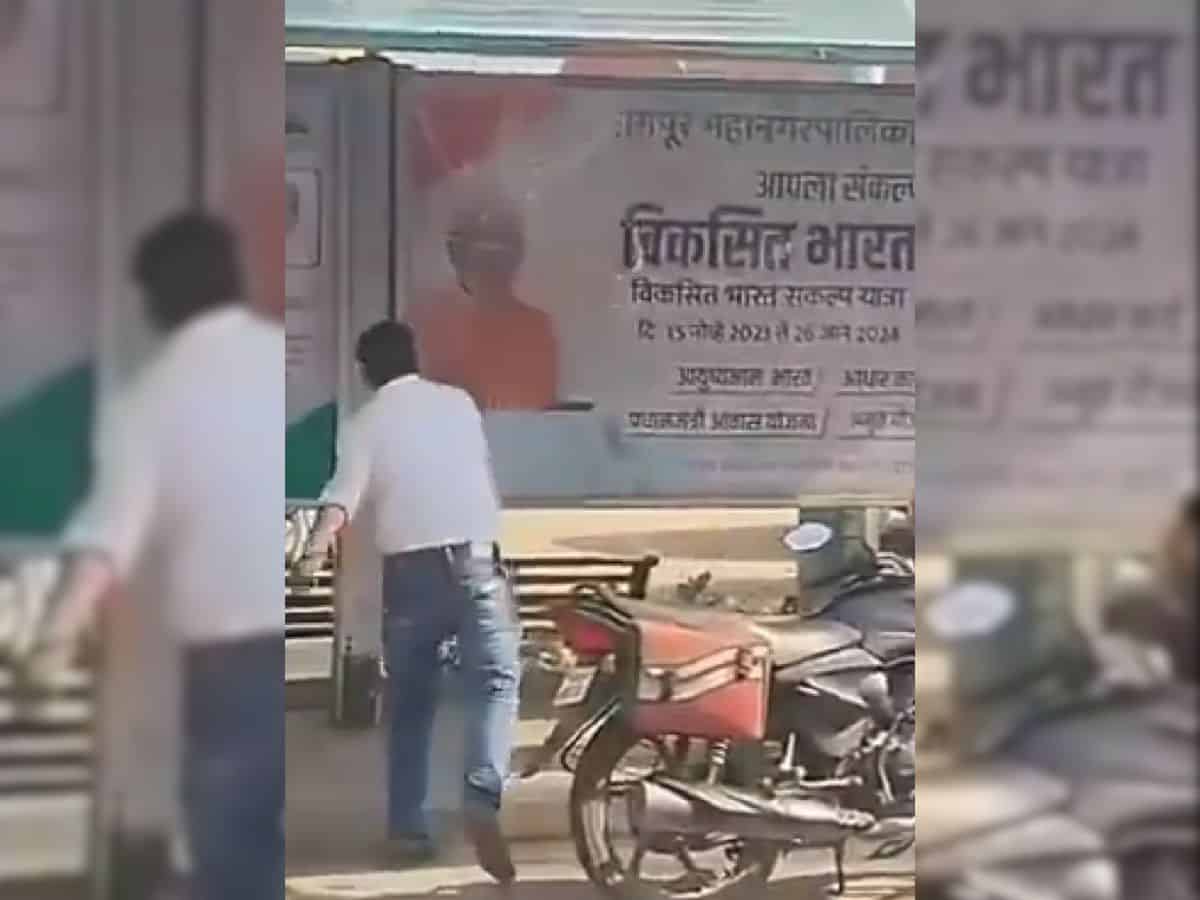 Watch: Man pelts stone at a poster of PM Modi in Maharashtra