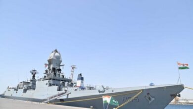 Indian naval warship reaches hijacked ship, warns pirates