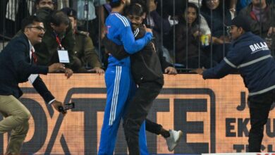 Man hug Virat Kohli during T20 match