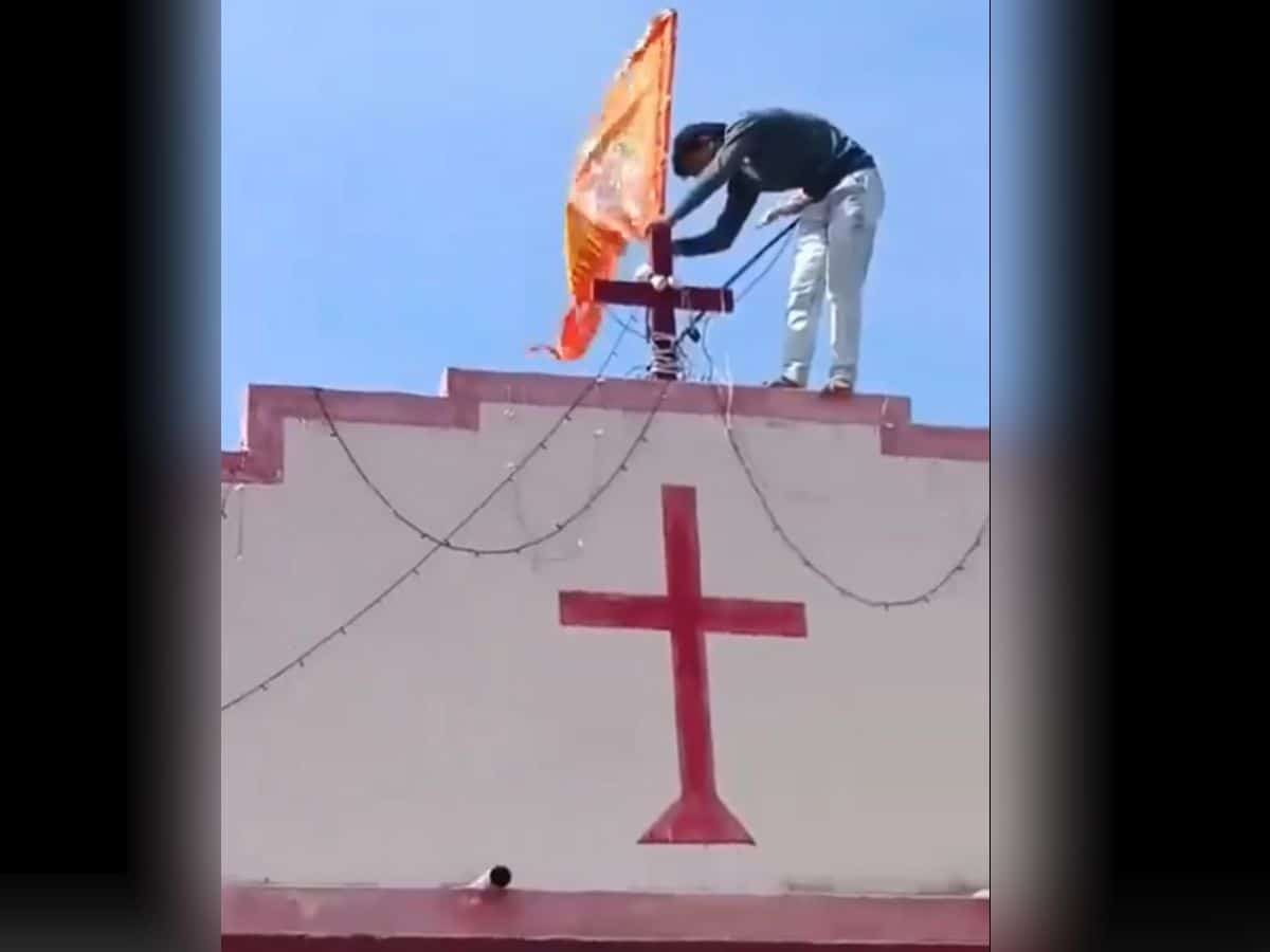 MP: Hindutva men plant saffron flgas atop church, chant Jai Shri Ram