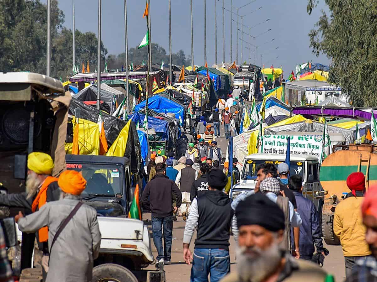 Patiala: Tractors and trolleys of the protesting farmers parked on a highway during their ongoing protest over various demands, including a legal guarantee of minimum support price (MSP) for crops, at the Punjab-Haryana Shambhu Border, in Patiala district, Thursday, Feb. 22, 2024. (PTI Photo)