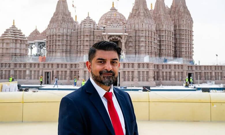 Indian-origin banker quits high-paying job to volunteer at Abu Dhabi BAPS Hindu mandir