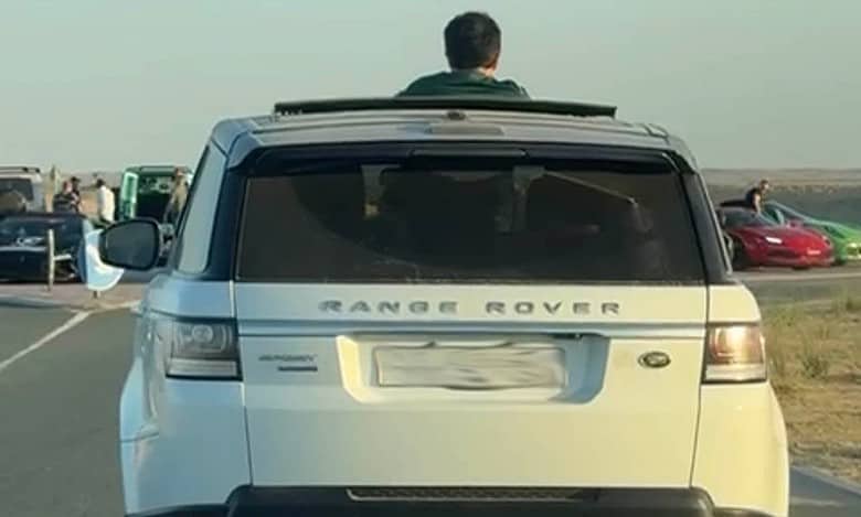 Rs 45K fine for leaning out of moving car's window, sunroof in Dubai, Abu Dhabi
