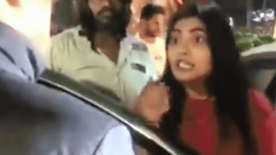 Video: Woman assaults traffic home guard in Banjara Hills