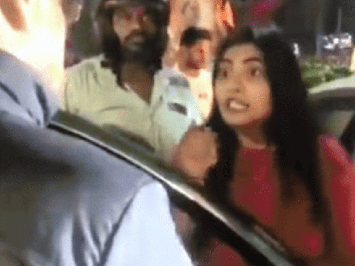 Video: Woman assaults traffic home guard in Banjara Hills