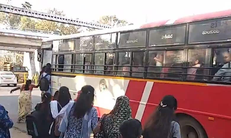 Video: Woman boarding packed TSRTC bus falls while boarding, escapes unhurt