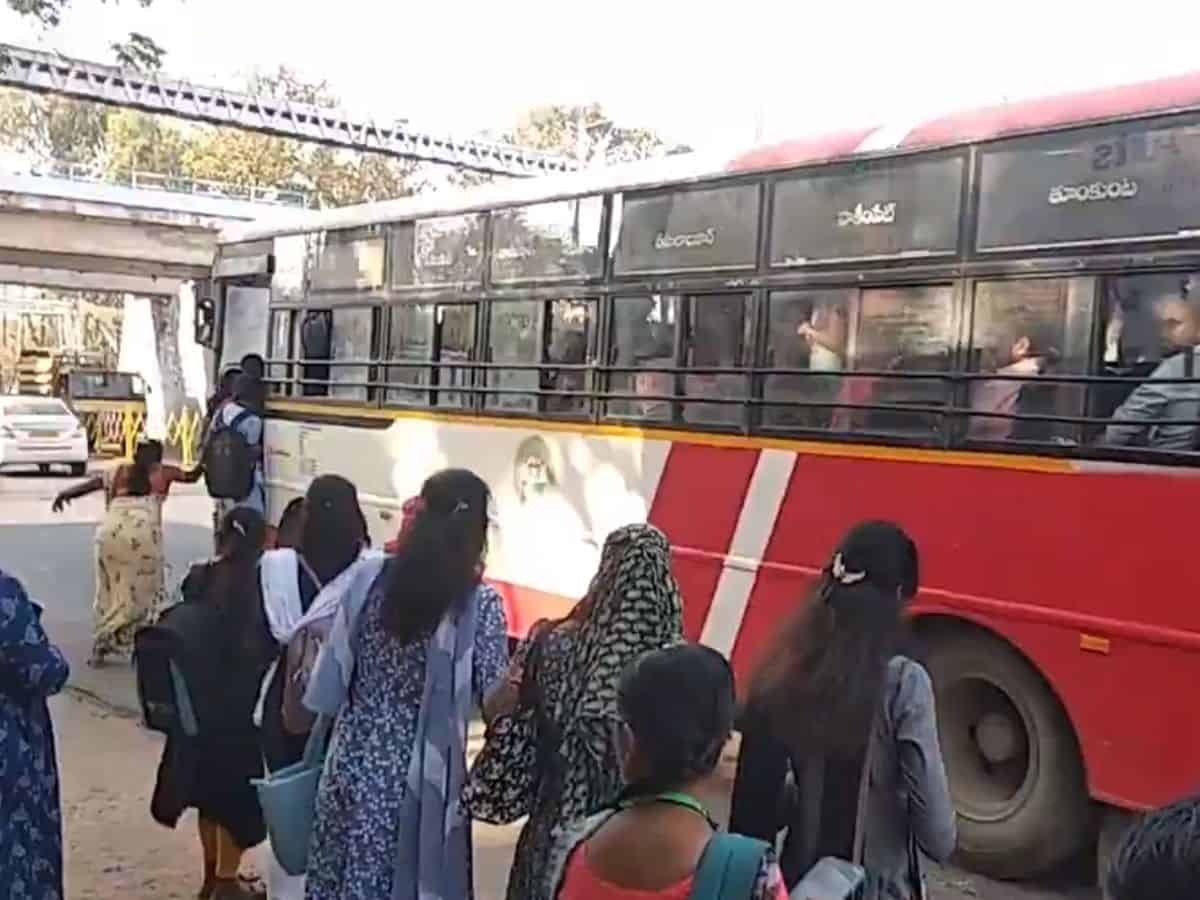 Video: Woman boarding packed TSRTC bus falls while boarding, escapes unhurt