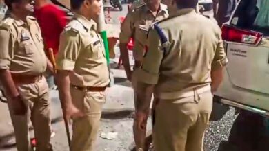 Security personnel stand guard following the death of jailed gangster-turned-politician Mukhtar Ansari, in Mau,