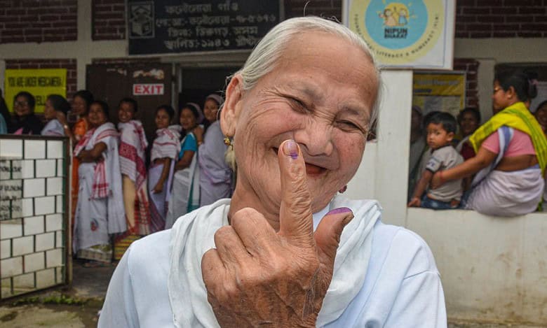 Dibrugarh: A 90-yr old voter shows her ink-marked finger casting her vote for the first phase of Lok Sabha polls, in Dibrugarh, Friday, April 19, 2024. (PTI Photo) (PTI04_19_2024_000348B)