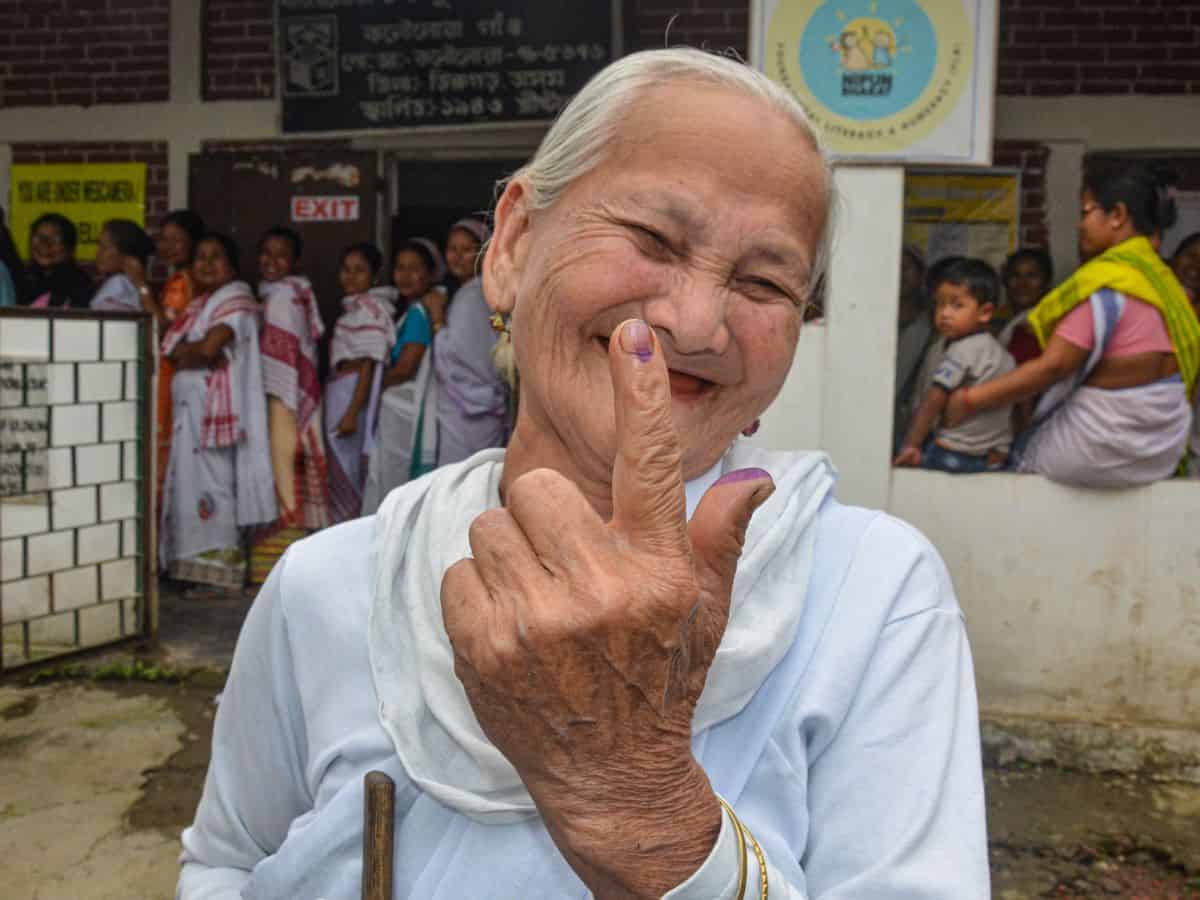 Dibrugarh: A 90-yr old voter shows her ink-marked finger casting her vote for the first phase of Lok Sabha polls, in Dibrugarh, Friday, April 19, 2024. (PTI Photo) (PTI04_19_2024_000348B)