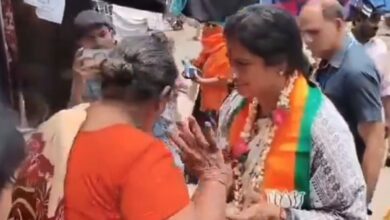 Woman pushes BJP Hyderabad MP candidate during campaigning
