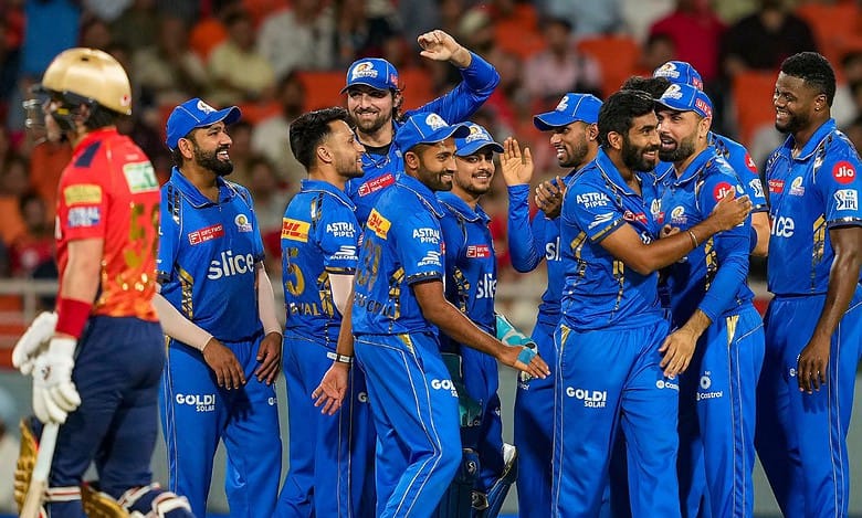 Mohali: Mumbai Indians bowler Jasprit Bumrah with teammates celebrates the wicket of Punjab Kings batter Sam Curran during the Indian Premier League (IPL) 2024 cricket match between Punjab Kings (PBKS) and Mumbai Indians (MI) at Maharaja Yadavindra Singh International Cricket Stadium, Mullanpur, in Mohali, Thursday, April 18, 2024. (PTI Photo)