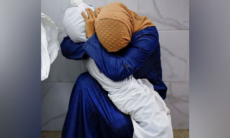 Photo of Palestinian woman cradling niece's body wins World Press Photo award