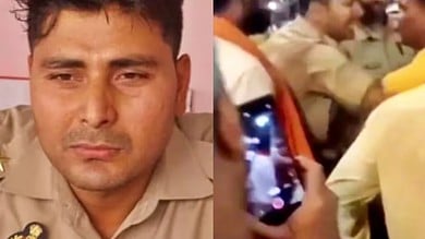 Video: Varanasi police inspector attacked by Hindutva men