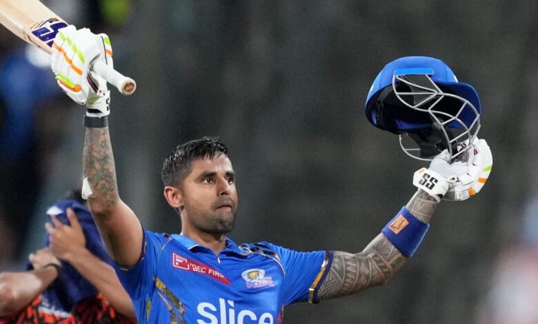 Mumbai Indians player Suryakumar Yadav celebrates his century during the Indian Premier League (IPL) 2024 T20 cricket match between Mumbai Indians and Sunrisers Hydrabad, at Wankhede Stadium in Mumbai,