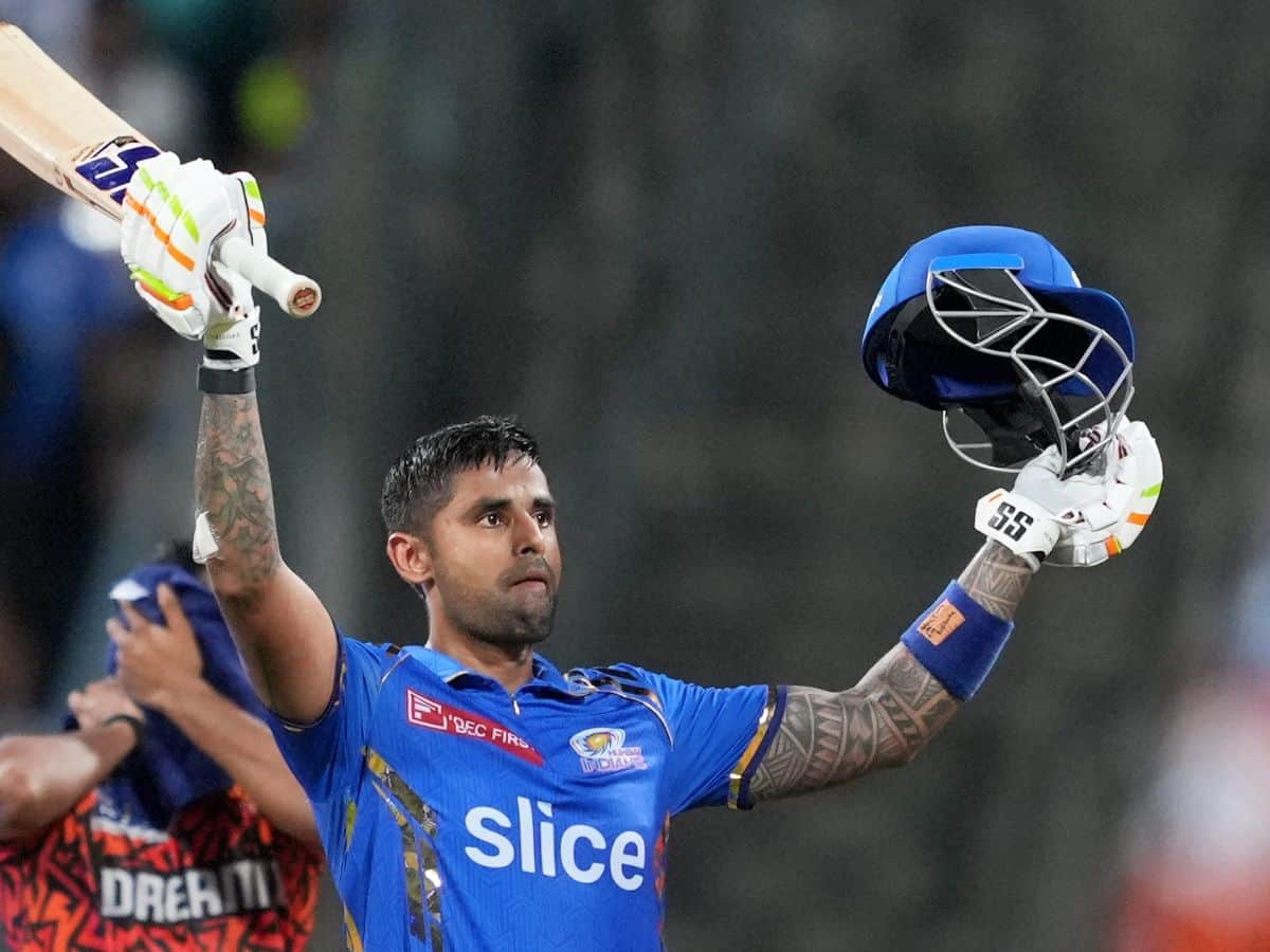 Mumbai Indians player Suryakumar Yadav celebrates his century during the Indian Premier League (IPL) 2024 T20 cricket match between Mumbai Indians and Sunrisers Hydrabad, at Wankhede Stadium in Mumbai,