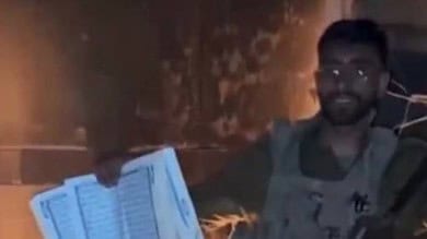 Israeli soldier tosses copy of Quran into fire in Gaza, sparks outrage