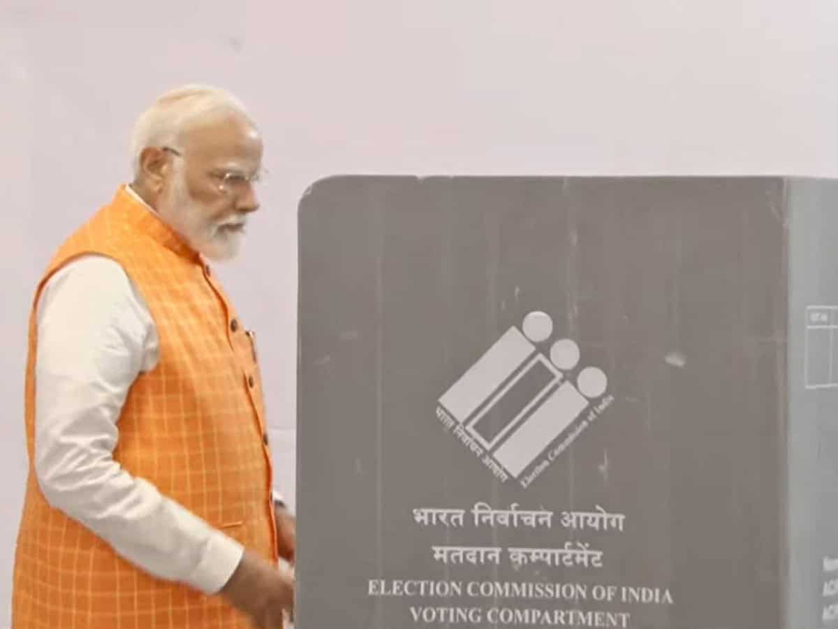 PM Modi votes at polling booth in Gandhinagar Lok Sabha constituency