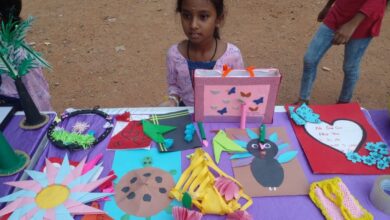 A girl child of Aman Vedika showcases their art and craft models at the concluding ceremony of their summer camp at Musheerabad Government High School last week.