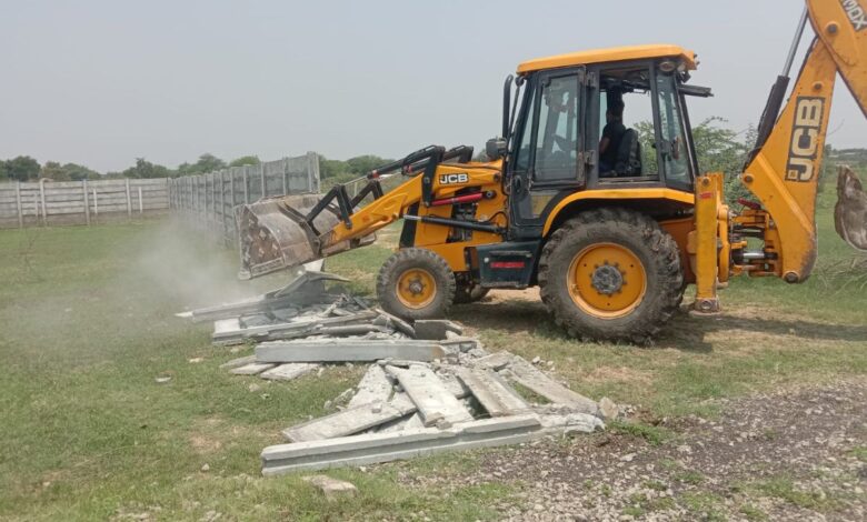 Malla Reddy and others have been accused of encroaching 25 acres of FTL area under Peddacheruvu in Bomraspet village of Shameerpet mandal.