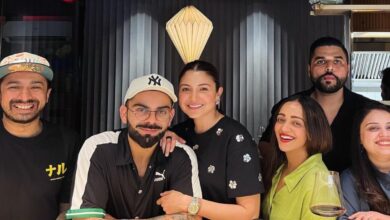 Anushka, Virat twin in black as they step out for date, poses with fans