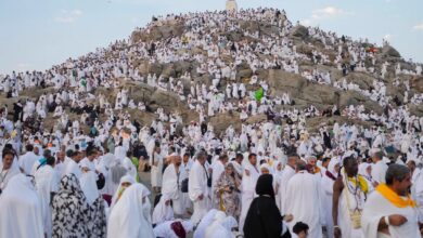 Muslim pilgrims gather at the top of the rocky hill known as the Mountain of Mercy, on the Plain of Arafat, during the annual Haj pilgrimage, near the holy city of Makkah In 2024.