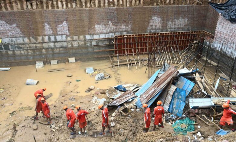 Rescue operation after wall collapse in Delhi