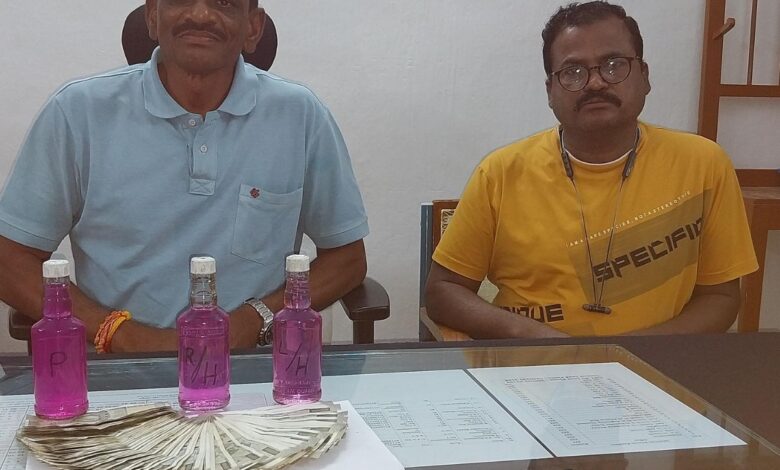 Telangana cop caught taking Rs 50K bribe