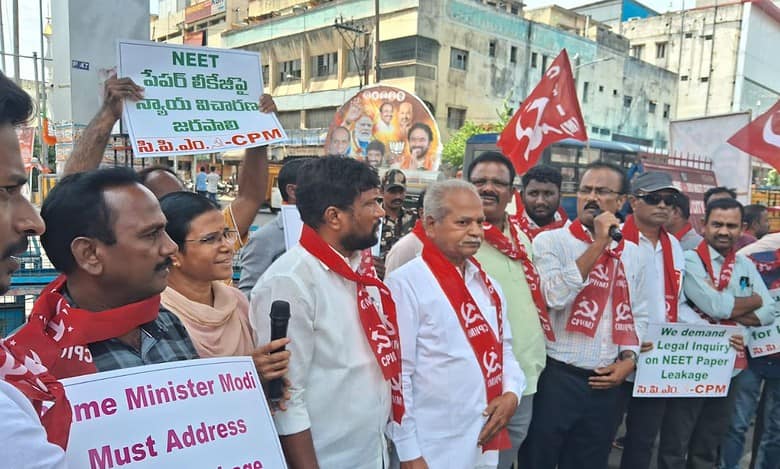Activists of CPM's city unit stage protest at RTC X Roads on Thursday, demanding a judicial inquiry into the leakage of the national eligibility-cum-entrance test (NEET) question paper.