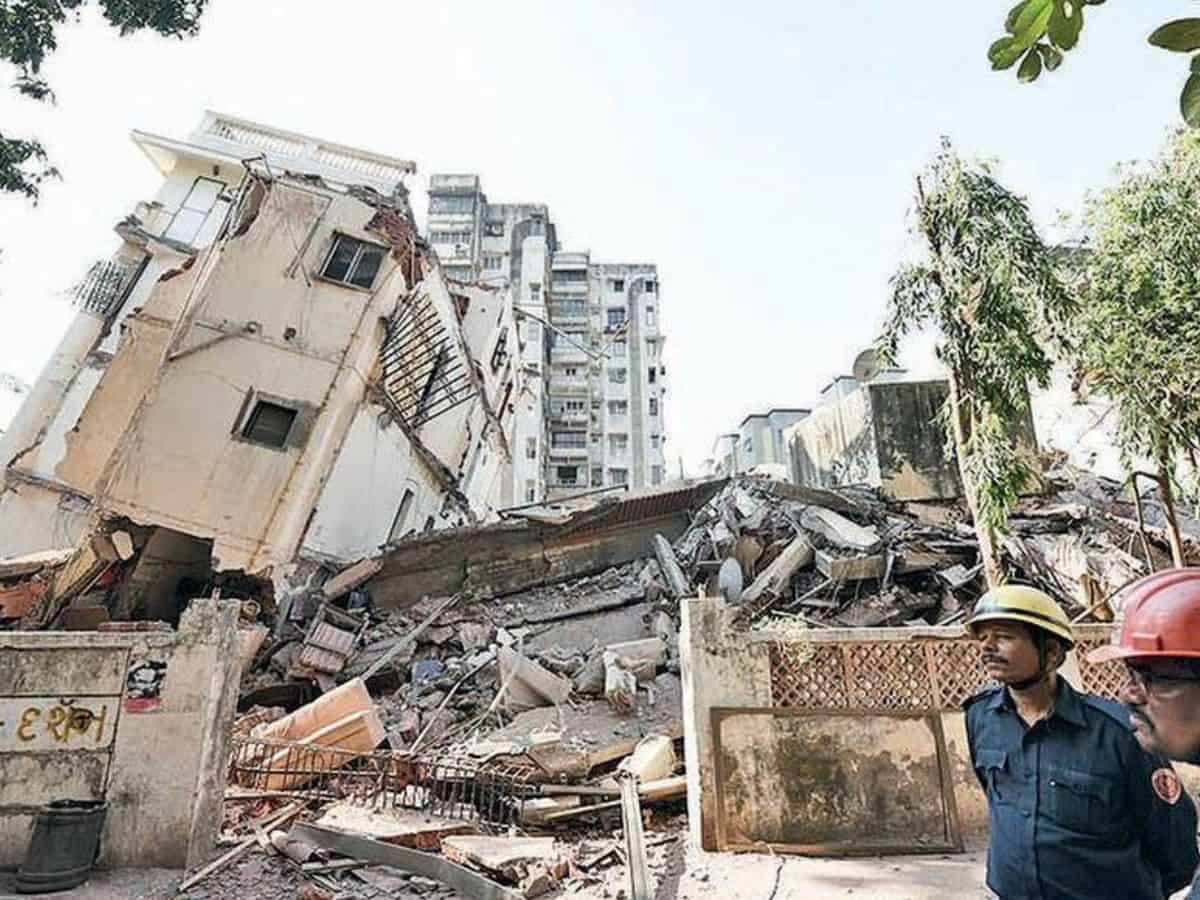Six-storey residential building collapses