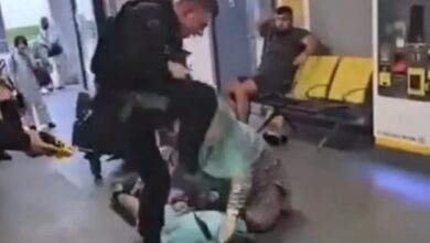 Video: Police officer kick, stamps Muslim boy's head at Manchester Airport