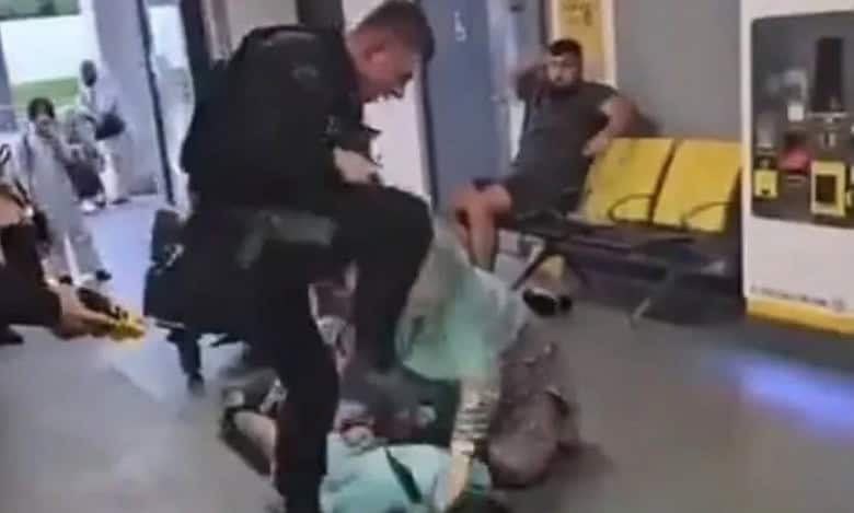Video: Police officer kick, stamps Muslim boy's head at Manchester Airport
