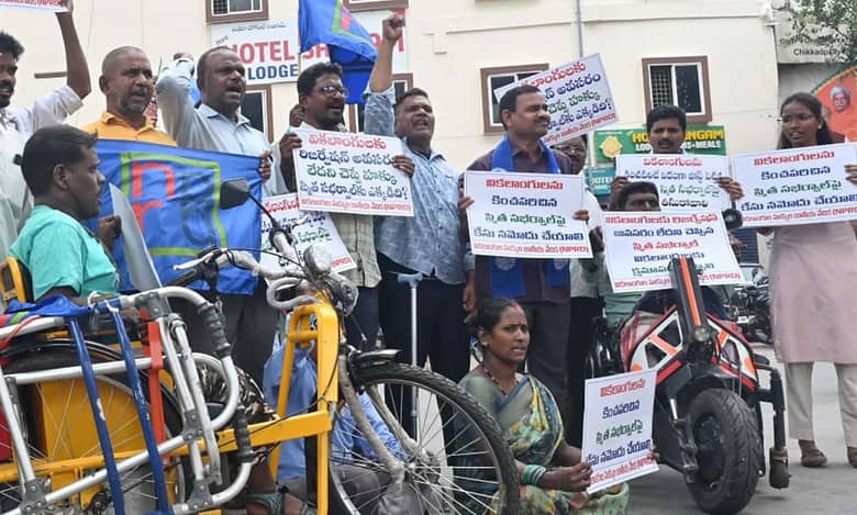 NPRD activists stage a protest at the RTC X Roads on Monday, demanding Smita Sabharwal to tender her apology to the differently-abled community.