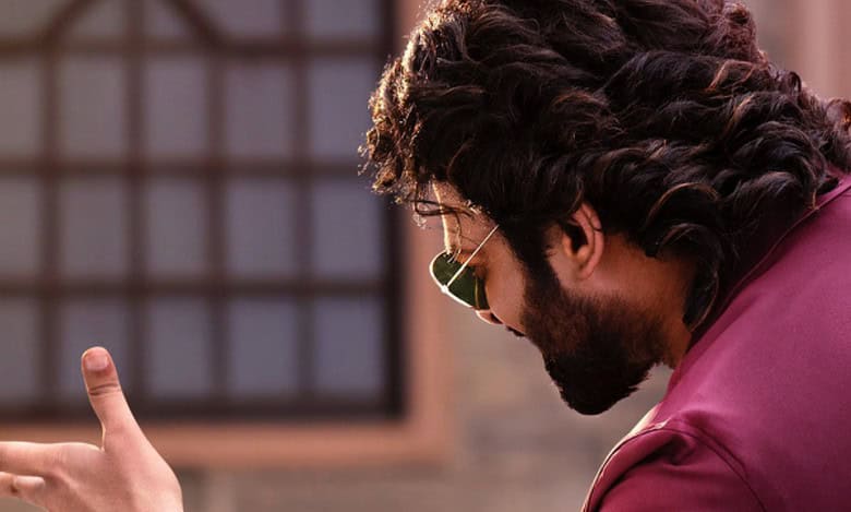 Prabhas stylish look revealed in 'The Raja Saab' poster