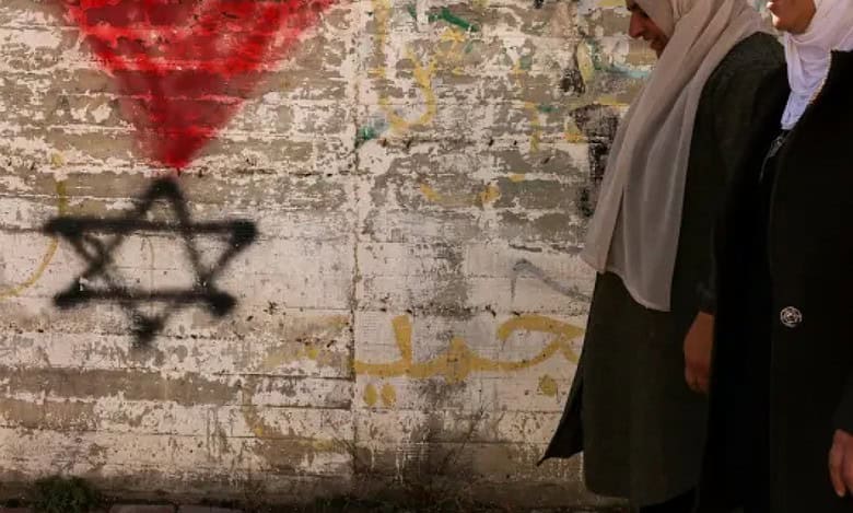 German House bans red triangle symbol used by Hamas