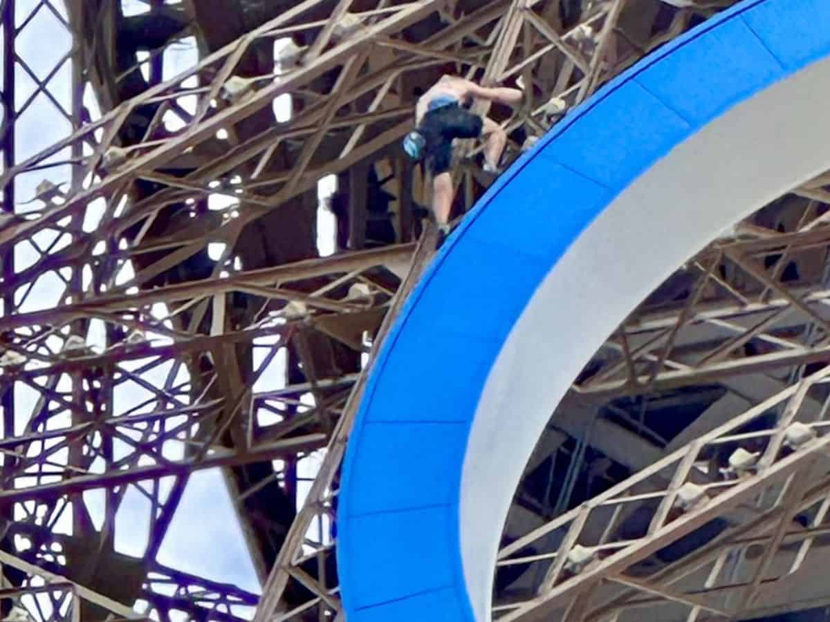 Man on eiffel tower