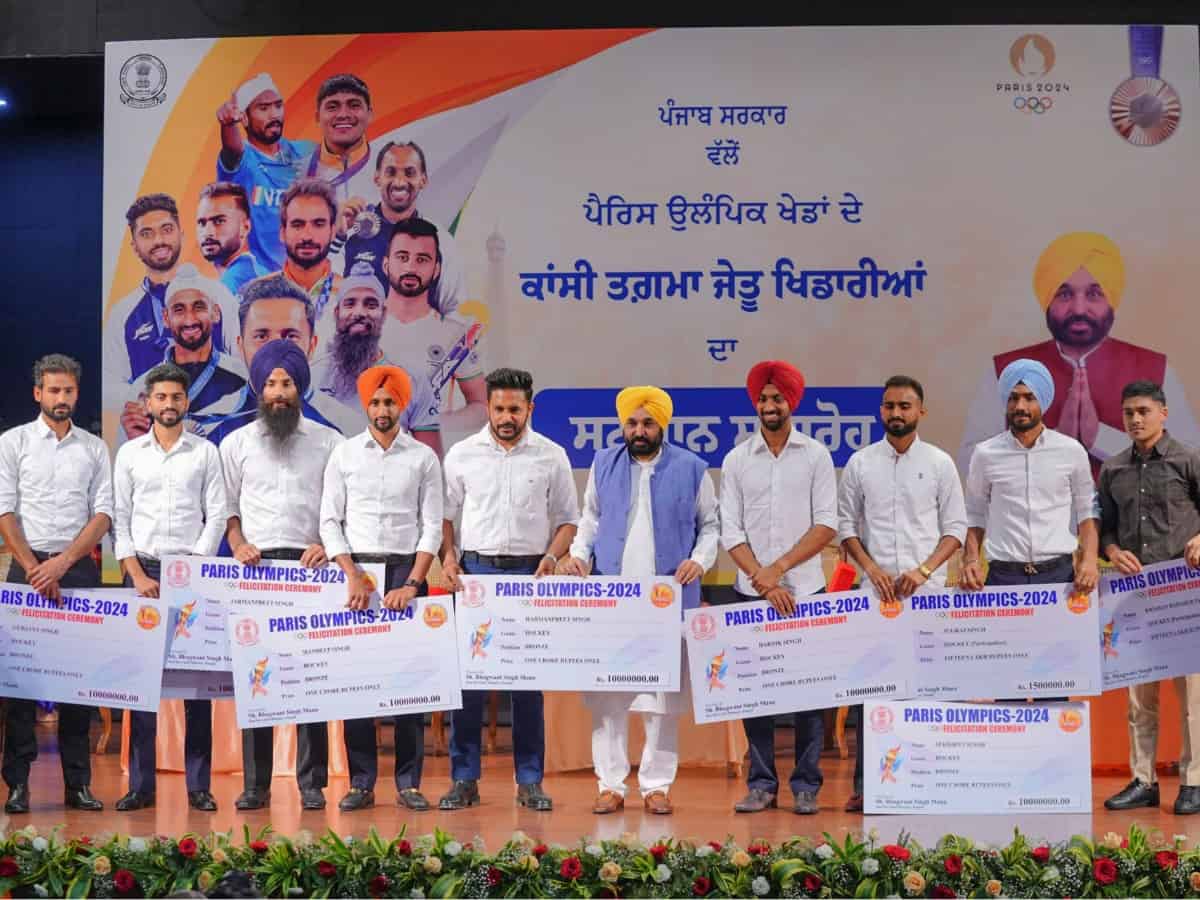 Punjab Chief Minister felicitated eight Olympic hockey players of the state with a cash prize of Rs 1 crore each