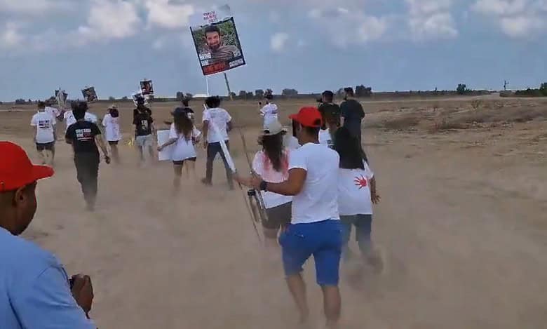 Israeli families breach Gaza fence to bring back hostages