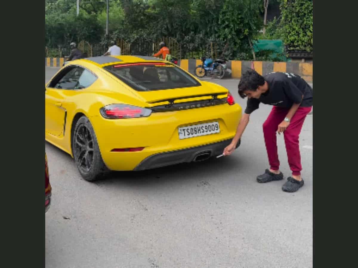 Hyderabad man criticized for trying to light cigarette with Porsche exhaust
