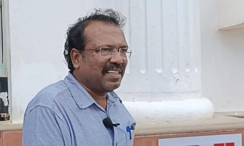 Former Congress leader Bakka Judson pastes 'RB-X' poster at Secretariat entrance on Monday, wants it demolished.