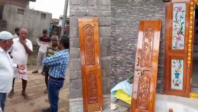 DCCB Adilabad bank officials try to recover loan by taking way new teak wood doors of the borrower.